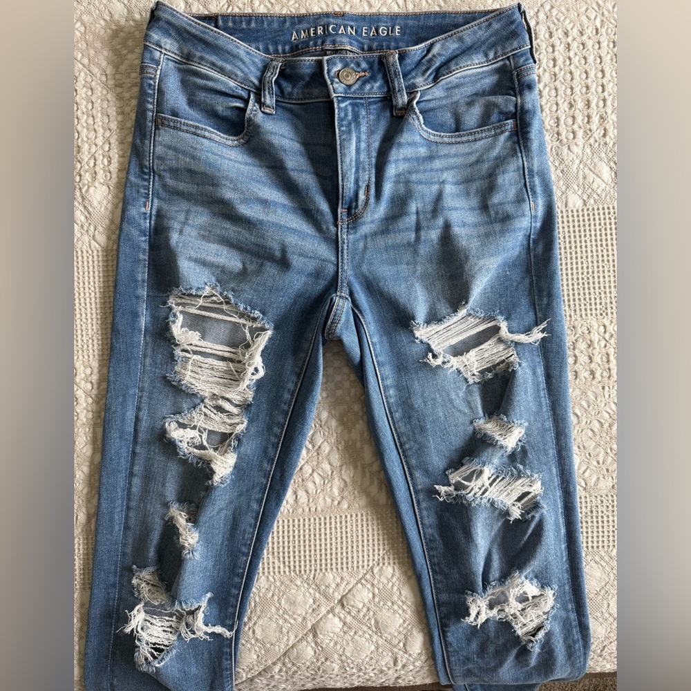 American Eagle Outfitters Light Blue Ripped Jegging (size 8 long)